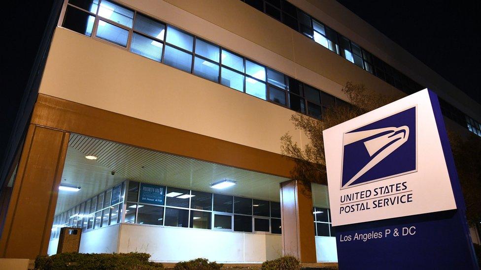 Photo shows the entrance to the United States Postal Service (USPS) Processing and Distribution Center in Los Angeles