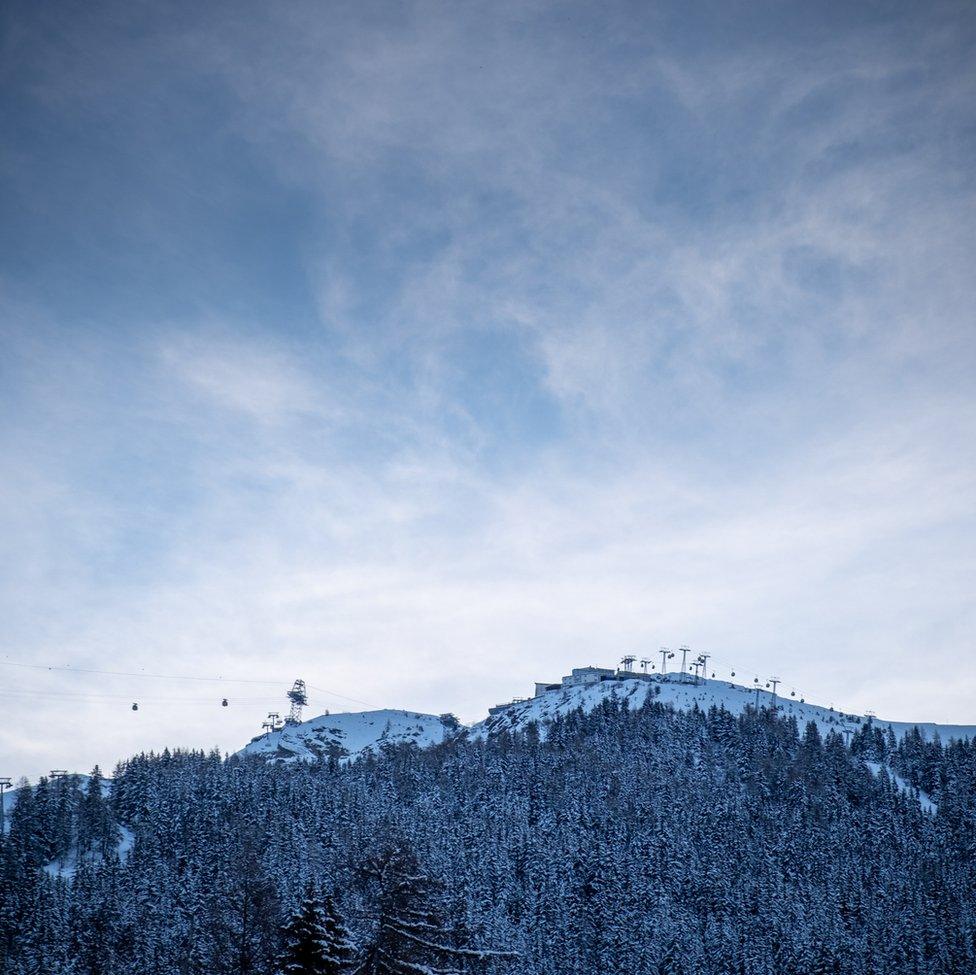 An image of snow-covered ridge