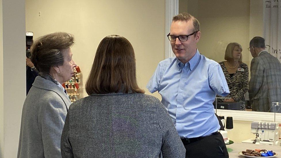 The Princess Royal speaks to Andy Stevenson, born without hands.