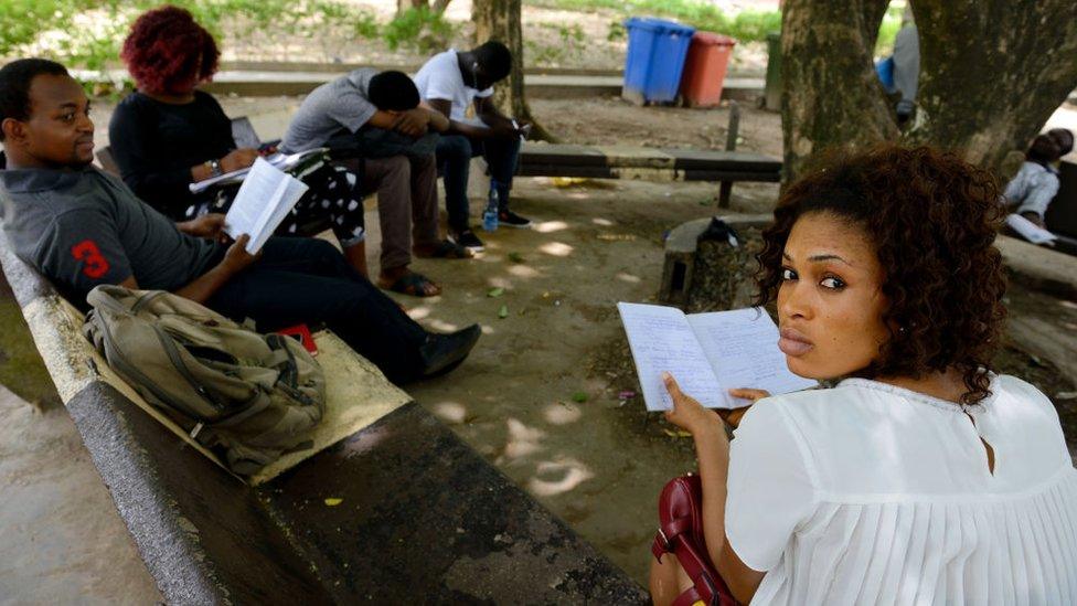 Students with open books at a Nigerian university