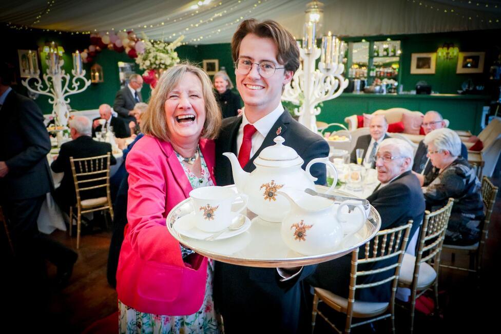 Wilma Goodwin dances with Dumfries House butler Lewis Mackenzie