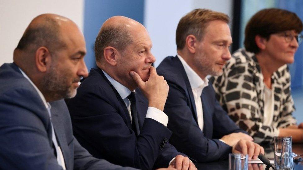 Greens co-leader Omid Nouripour, Chancellor Scholz, FDP leader Christian Lindner and SPD deputy leader Saskia Esken at news conference