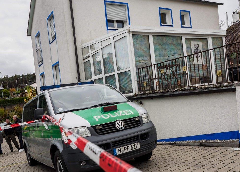 A police car in front of a house of a member of the so-called Reichsbuerger movement in Georgensgmuend, southern Germany, on 19 October 2016