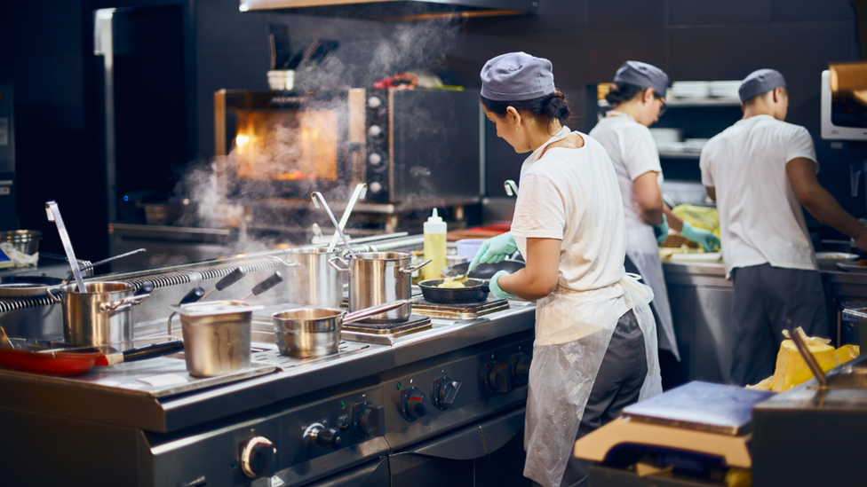 Kitchen staff in kitchen