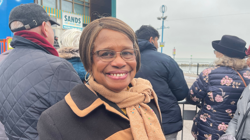 Lorna Thompson a woman standing on southend sea front to meet and see Prince Charles and celebrate Southend City atatus