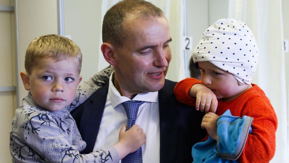 Gudni Johannesson with two of his children after casting his vote in Reykjavik, Iceland. 25 June 2016