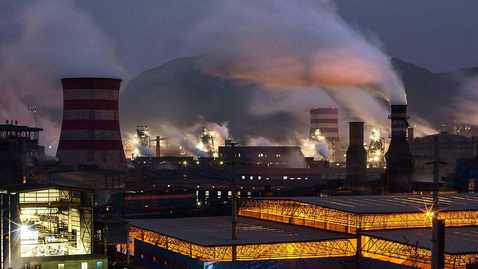 Coal emissions billowing from a steel factory in Hebei, China