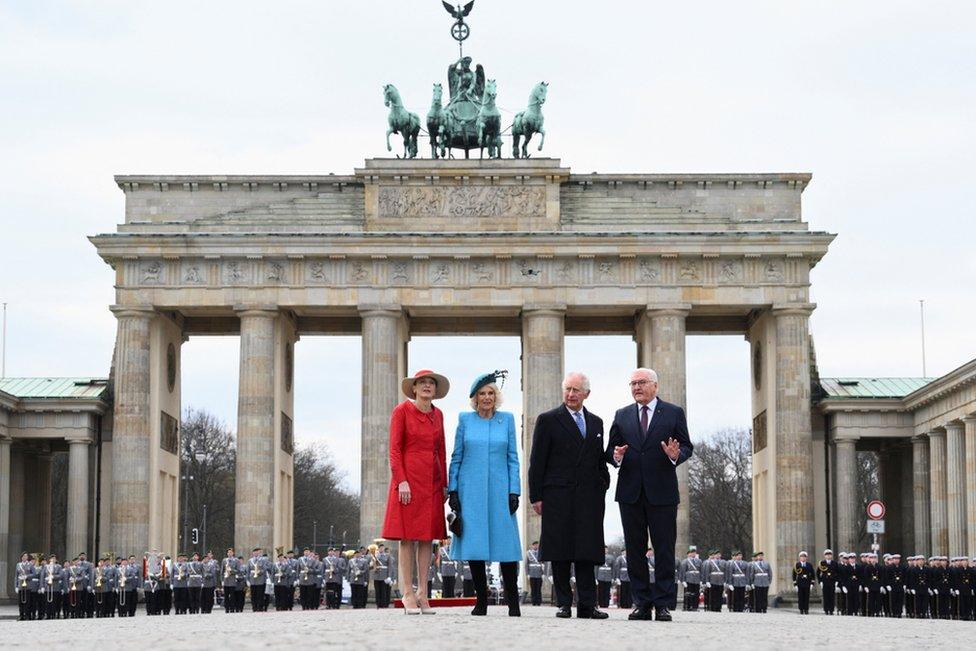 German President Frank-Walter Steinmeier, his wife Elke Buedenbender and Britain's King Charles and Camilla, the Queen Consort attend a welcome ceremony with military honours at Pariser Platz square in front of Brandenburg Gate in Berlin