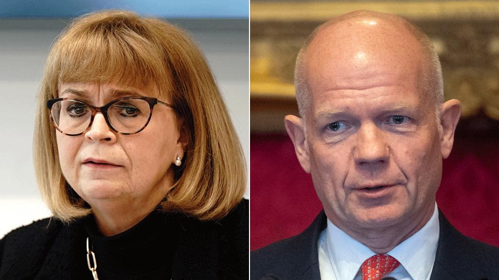 Pictures of Lady Elish Angiolini and Lord William Hague. Lady Elish Angiolini has red hair in a bob, wears glasses with cat-eye style frames, and a black top. Lord William Hague, who is bald on top with trimmed grey hair on the sides, wears a suit with a red tie.