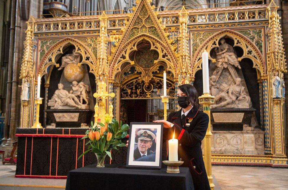 A tribute to Duke of Edinburgh is displayed alongside the nave at Westminster Abbey in London.