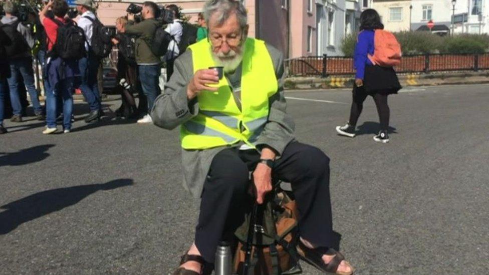 John Lynes, 91, at the climate protest