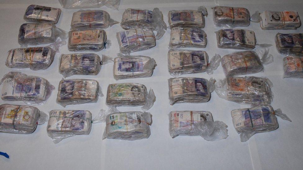 Piles of cash in freezer bags