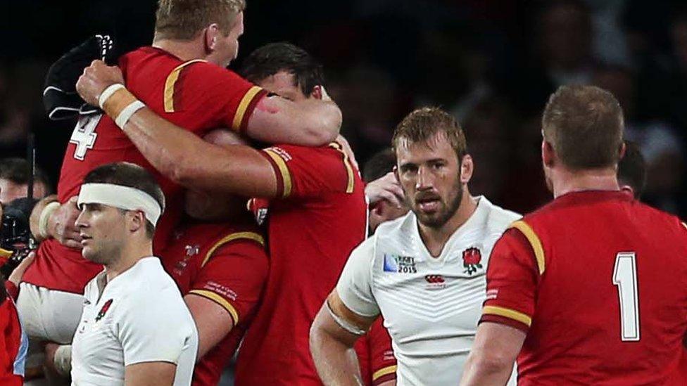 Wales celebrate their win against England