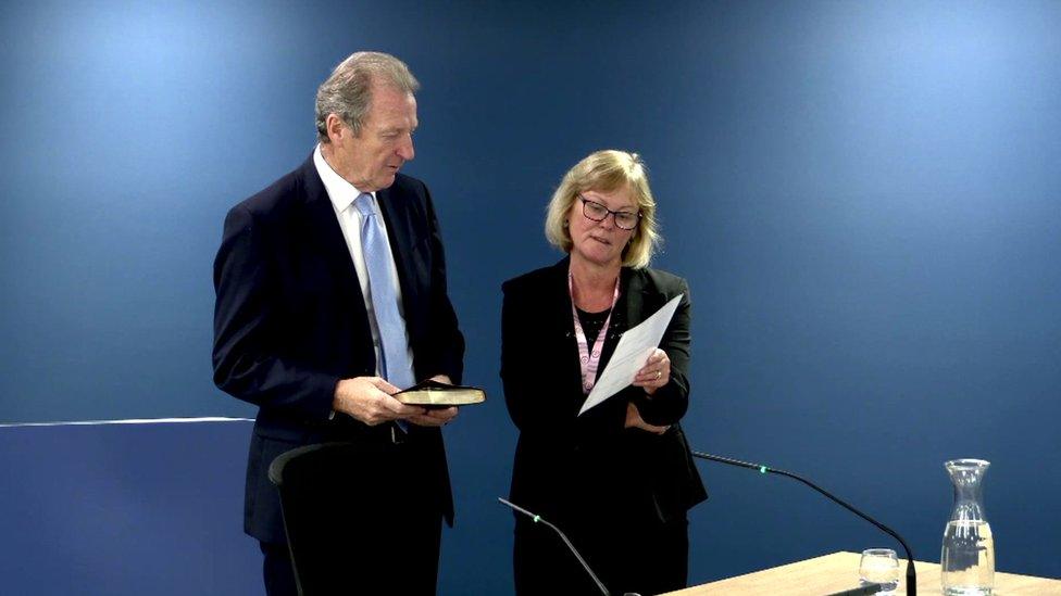 Lord O'Donnell, being sworn in at the inquiry