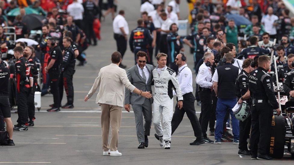 Javier Bardem and Brad Pitt at Silverstone