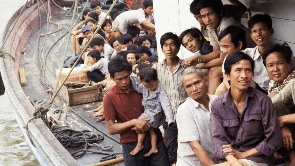 Picture of Vietnamese boat people crammed onto a wooden boat