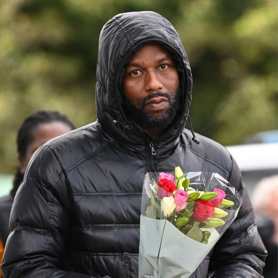 man with flowers