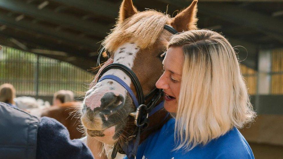 Horse and trainer