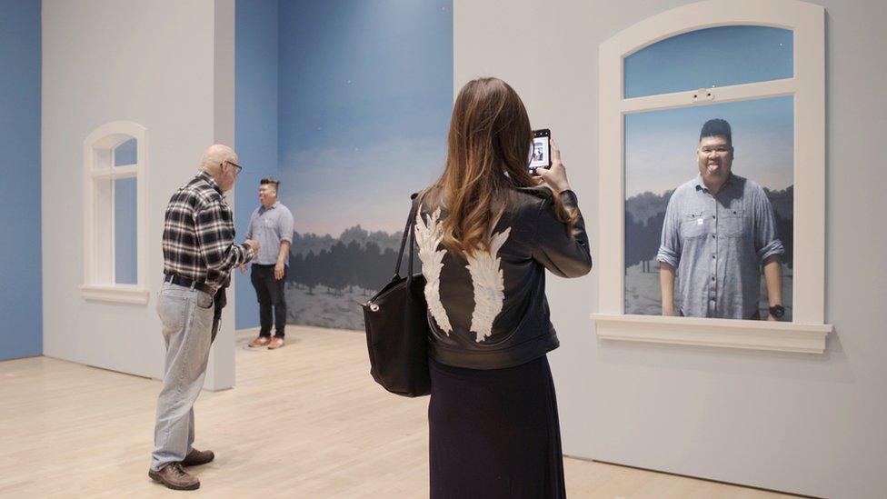 People at Rene Magritte exhibition in San Francisco