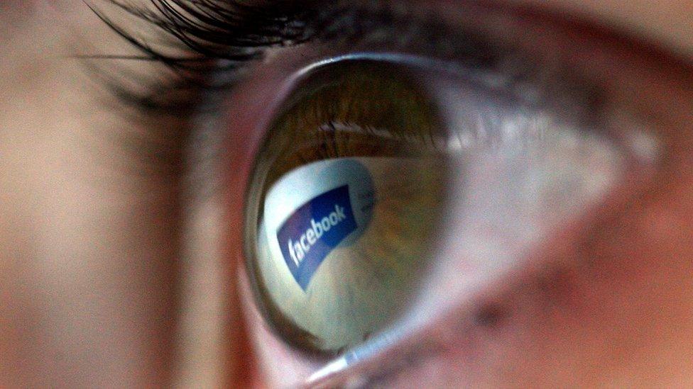 Facebook logo in an eye