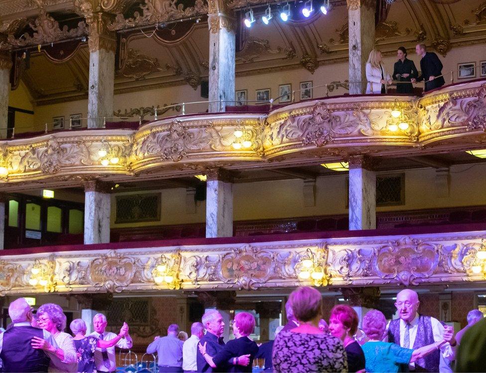 The duke and duchess watched dancers waltz in the Tower Ballroom