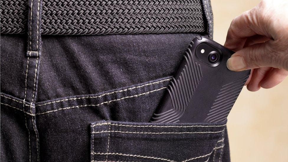 Phone being stolen from a man's back pocket