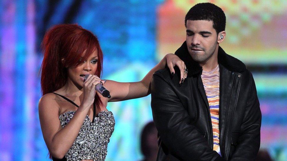 Singer Rihanna (L) and rapper Drake performing during the 2011 NBA All-Star game