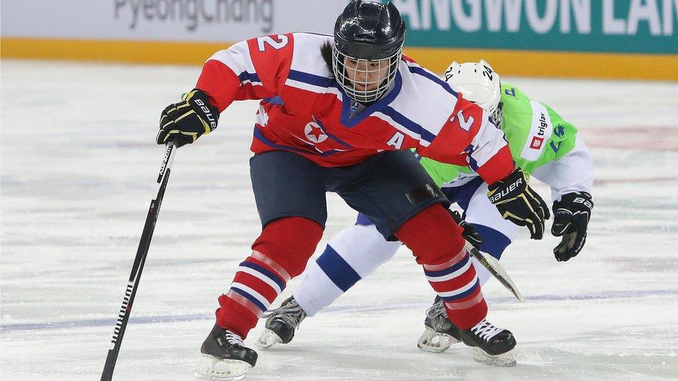 Jin Ok of North Korea's ice hockey team in action against Slovenia