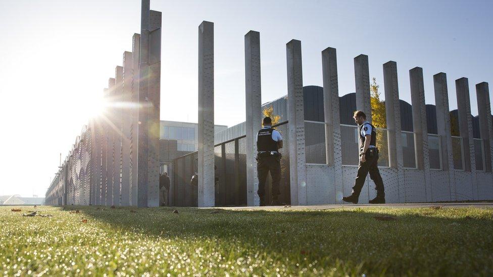 Dutch military police guard the extra secure court building at Schiphol airport. 31 Oct 2016