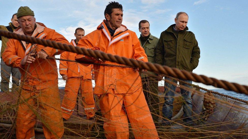 President Putin and Prime Minister Medvedev visit fishermen during the Duma election campaign