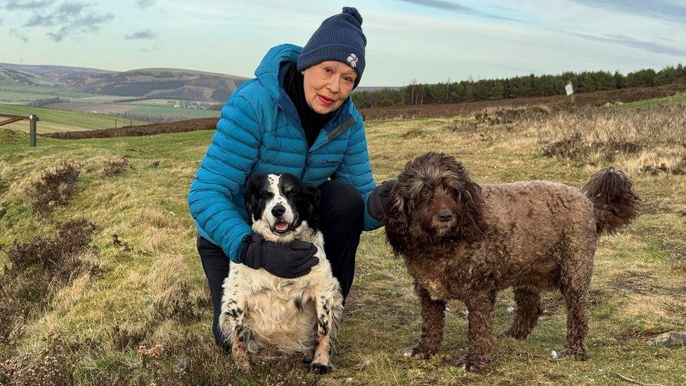 Caroline Barron with her two dogs