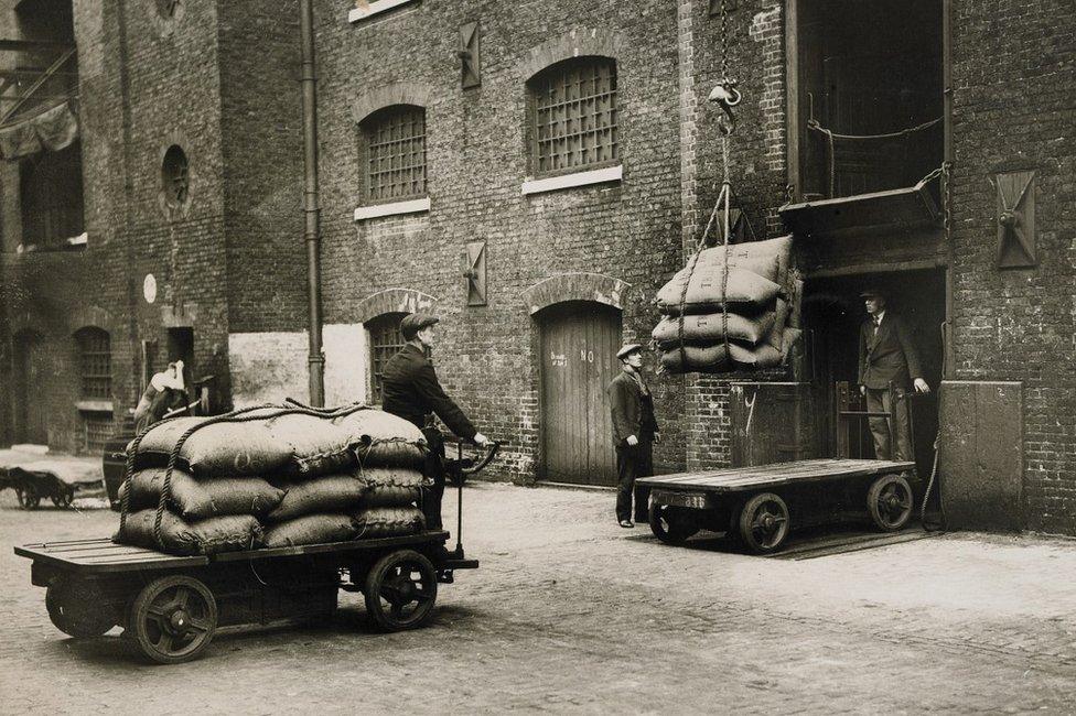 Sugar arriving by electric truck for loading into warehouse, West India Dock.1935-1940