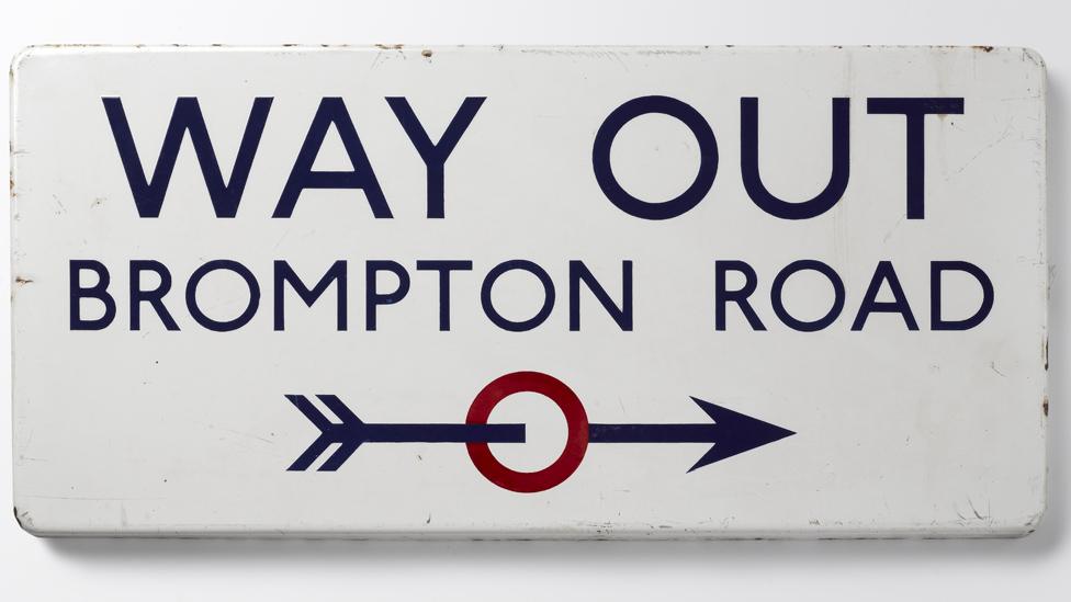 Johnston's Way Out sign for Brompton Road underground station