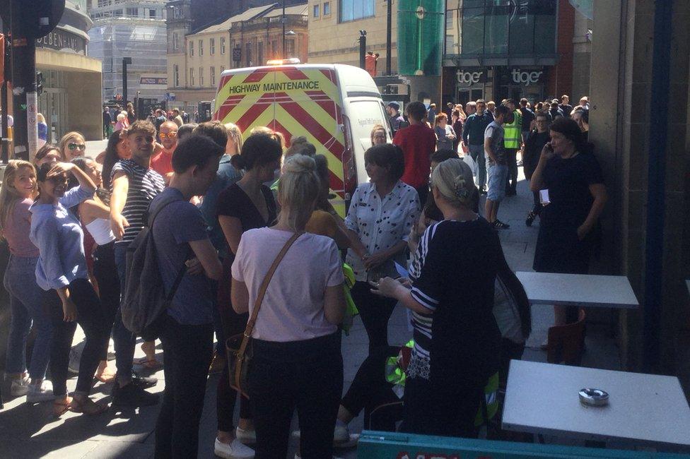 Shoppers outside Eldon Square shopping centre