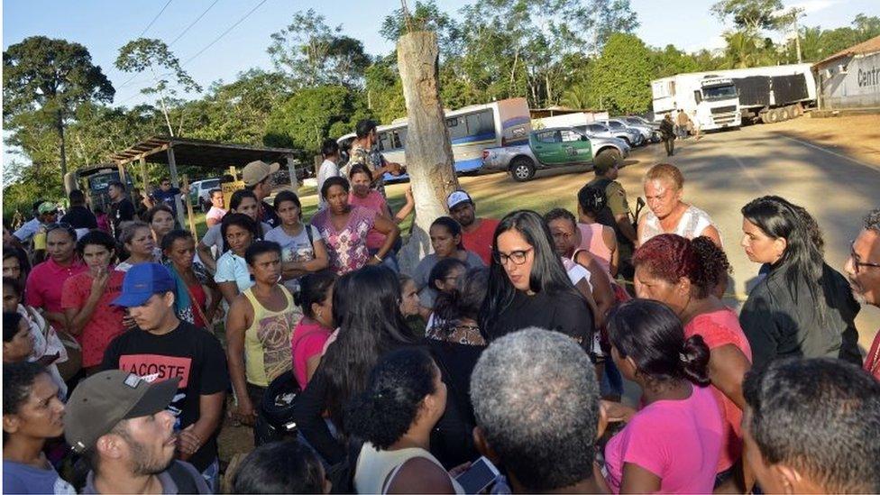 Relatives and friends of prisoners wait outside the Regional Recovery Centre in Altamira, Para state, Brazil, 29 July 2019