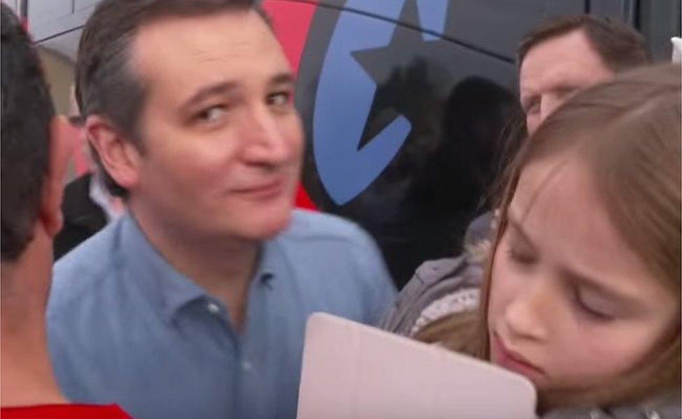 Ted Cruz's daughter flinches as he kisses her while campaigning in Iowa, February 2016