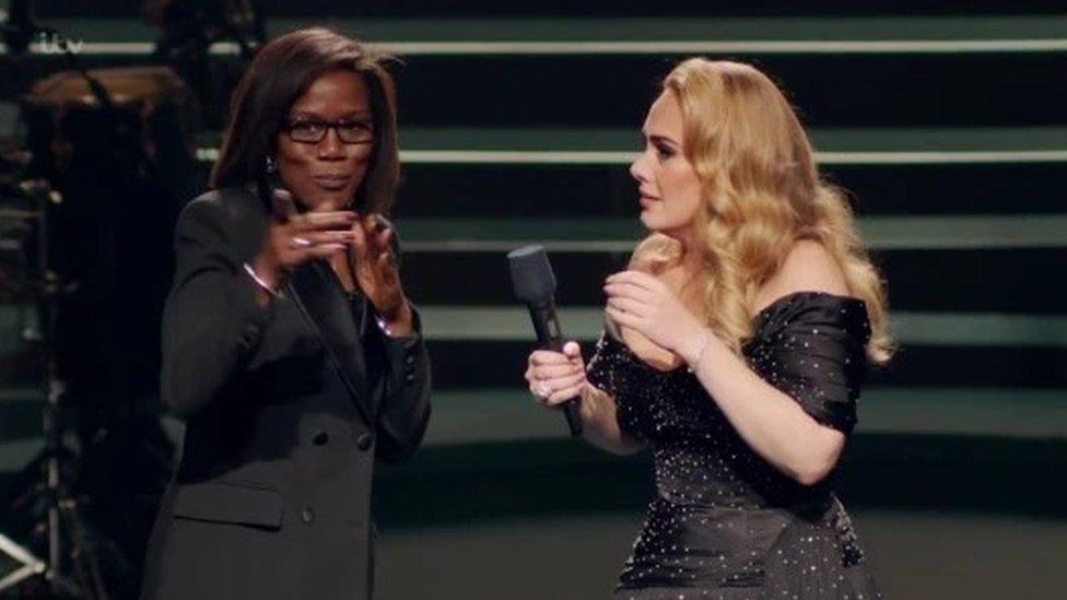 Adele reunited with her old English teacher