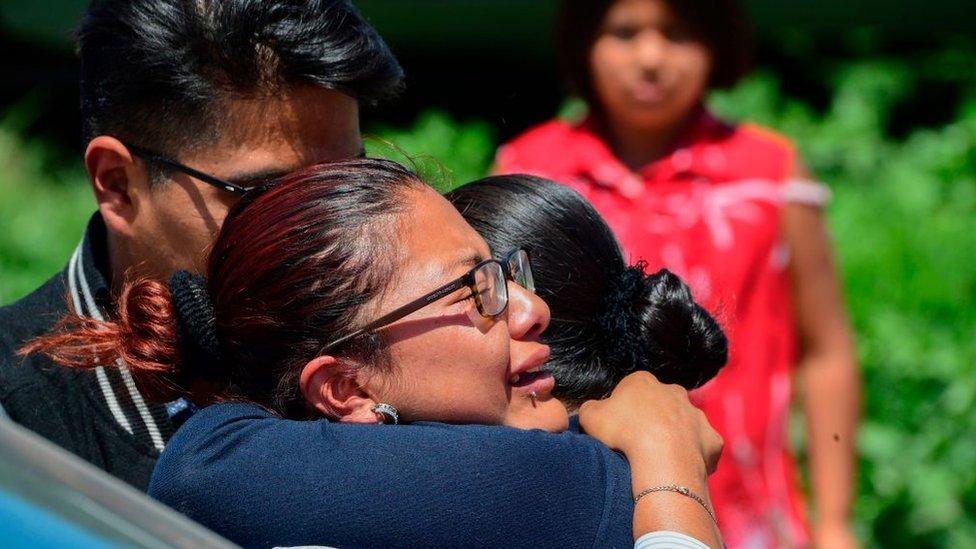 Crying people at Tultepec Mexico July 2018