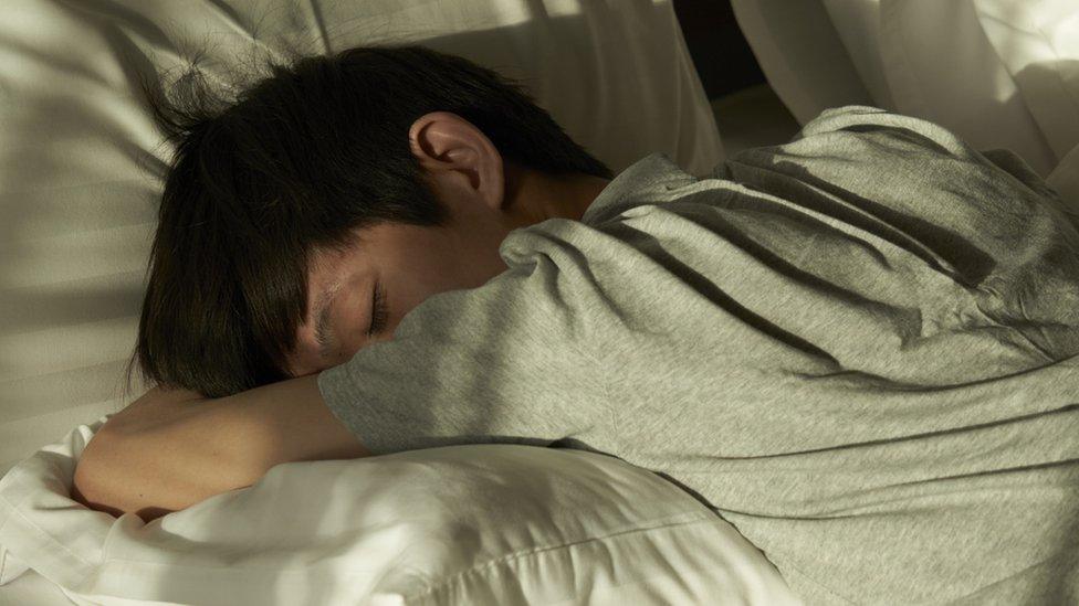 Boy on a bed