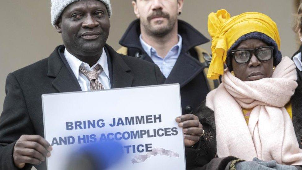 Victims and their relatives demonstrate in front of the Federal Criminal Court of Switzerland before the beginning of the trial against Gambia's former Interior Minister Ousman Sonko in Bellinzona, Switzerland, 08 January 2024. The federal prosecutor's office has accused Ousman Sonko of numerous crimes against humanity. The list of alleged offenses includes intentional homicide, grievous bodily harm, endangering life, rape and other criminal offenses, committed under former Gambian President Yahya Jammeh's regime.