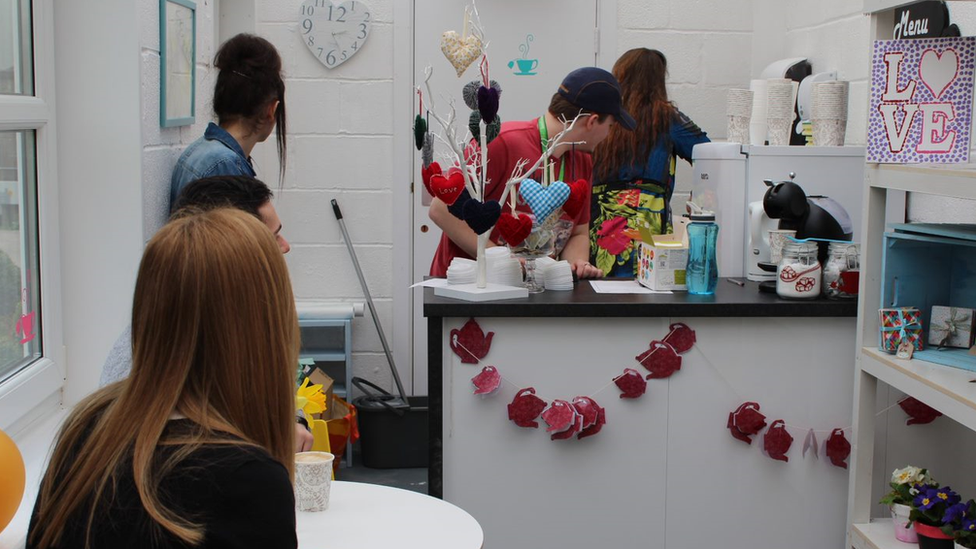 Students at Beechwood Collegeworking in its coffee shop