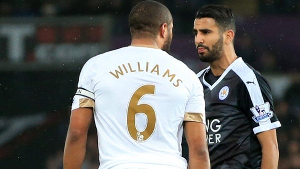 Swansea City's Ashley Williams and Leicester City's Riyad Mahrez