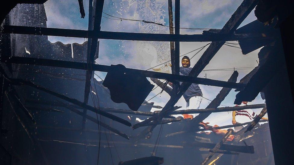 A fire being extinguished in Cape Town on 26 January