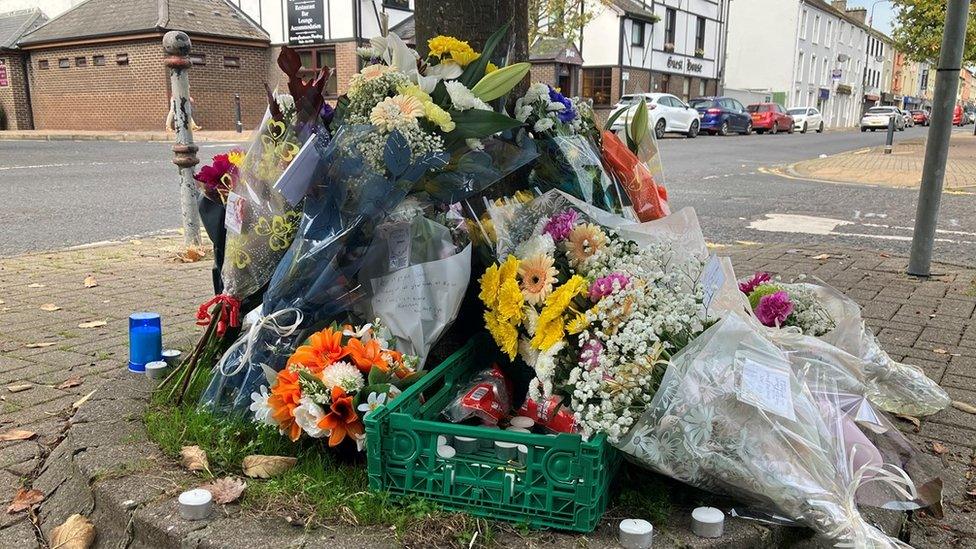 Flowers left at the scene in Castlederg