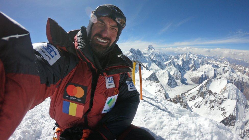 Alex Gavan on Gashebrum in July 2019 with K2 visible in the background