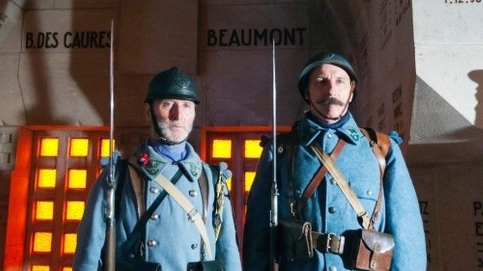 Men wearing military uniforms of the 56th and 59th light infantry battalions pose during a ceremony marking the centenary of the beginning of the battle of Verdun (21 February 2016)