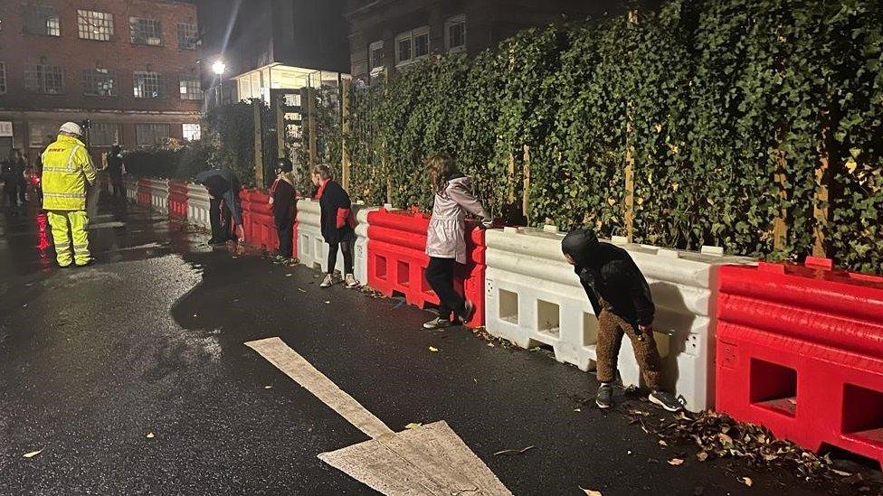 Children guard the blockades