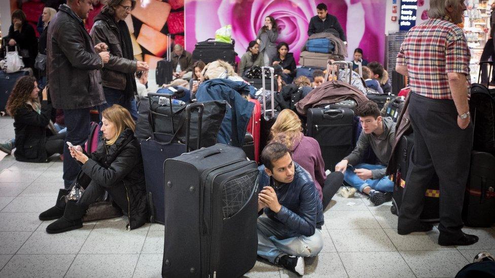 Delayed travellers at Gatwick Airport's North Terminal,