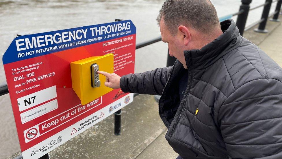 Firefighter Tommy Richardson and the new throw bag board on the Newcastle Quayside