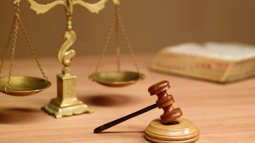 Scales of justice and a gavel